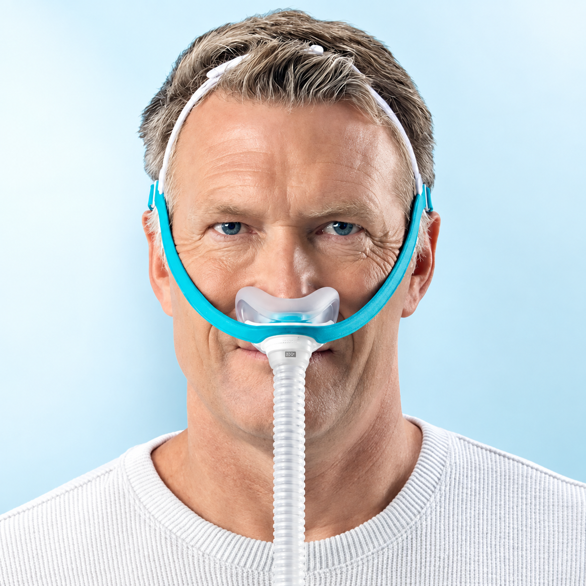 F&P Evora Nasal Mask with CapFit Headgear Worn by a Man