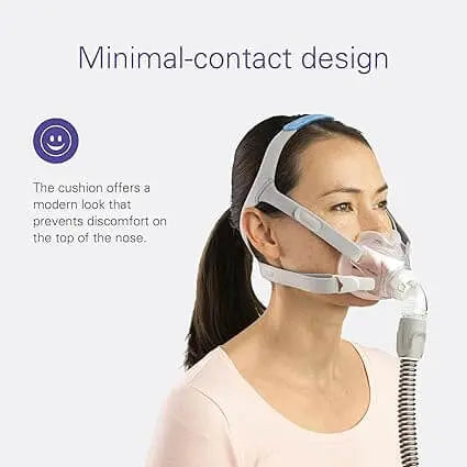 Woman wearing Airfit F30 mask with minimal-contact cushion design, preventing nose discomfort, ideal for comfort during sleep.